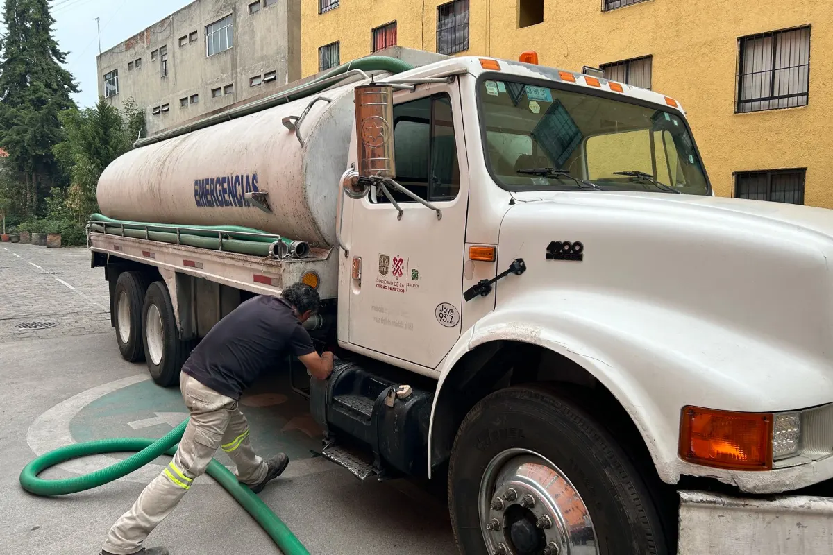 Pumping truck hose run to a septic tank